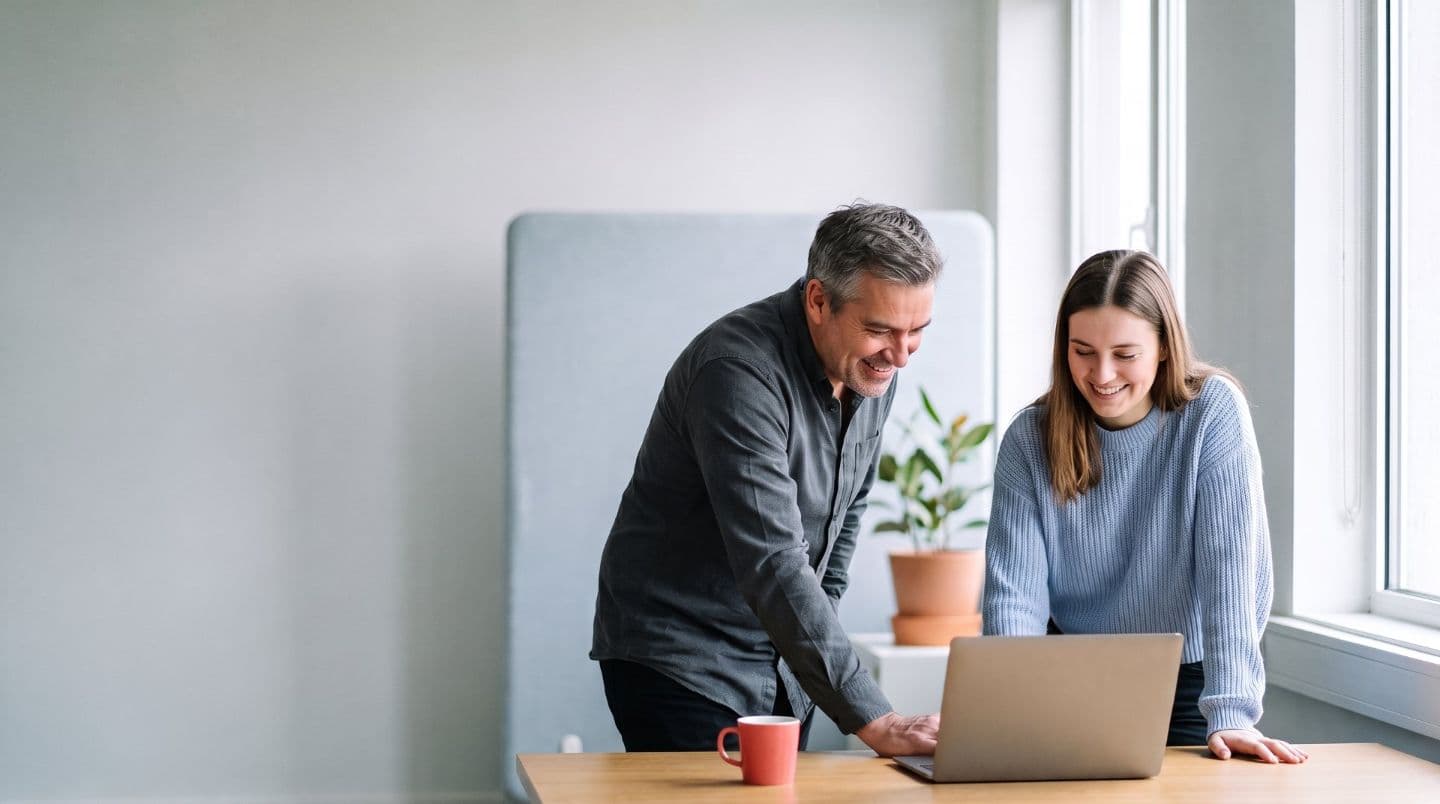 Two colleagues reviewing a shortlist together